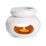 Quemador de aceite esencial de cerámica blanco con vela
